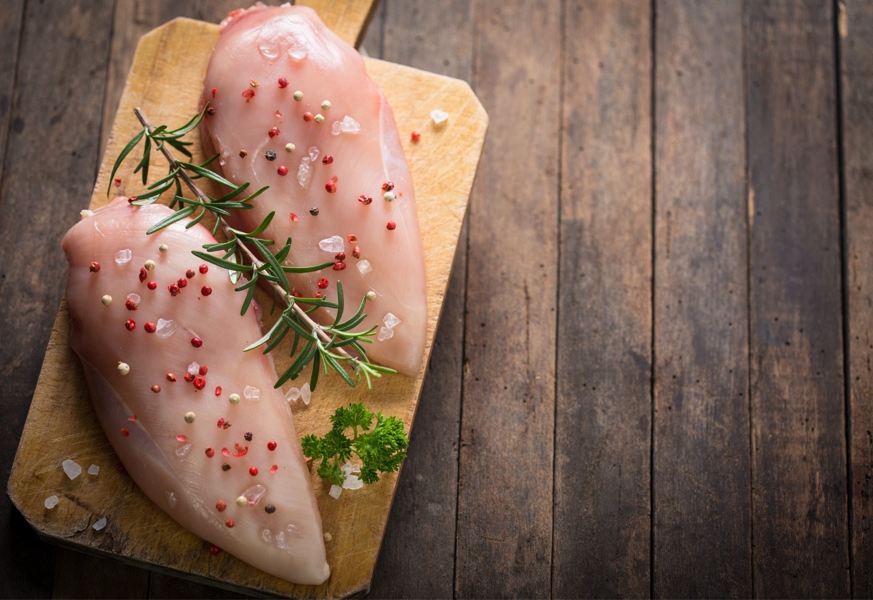 A labeled Buckeye FarmZ LLC package of boneless young chicken breasts