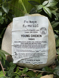 A labeled Buckeye FarmZ LLC package of young chicken thighs