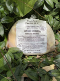 A labeled Buckeye FarmZ LLC package of boneless young chicken breasts