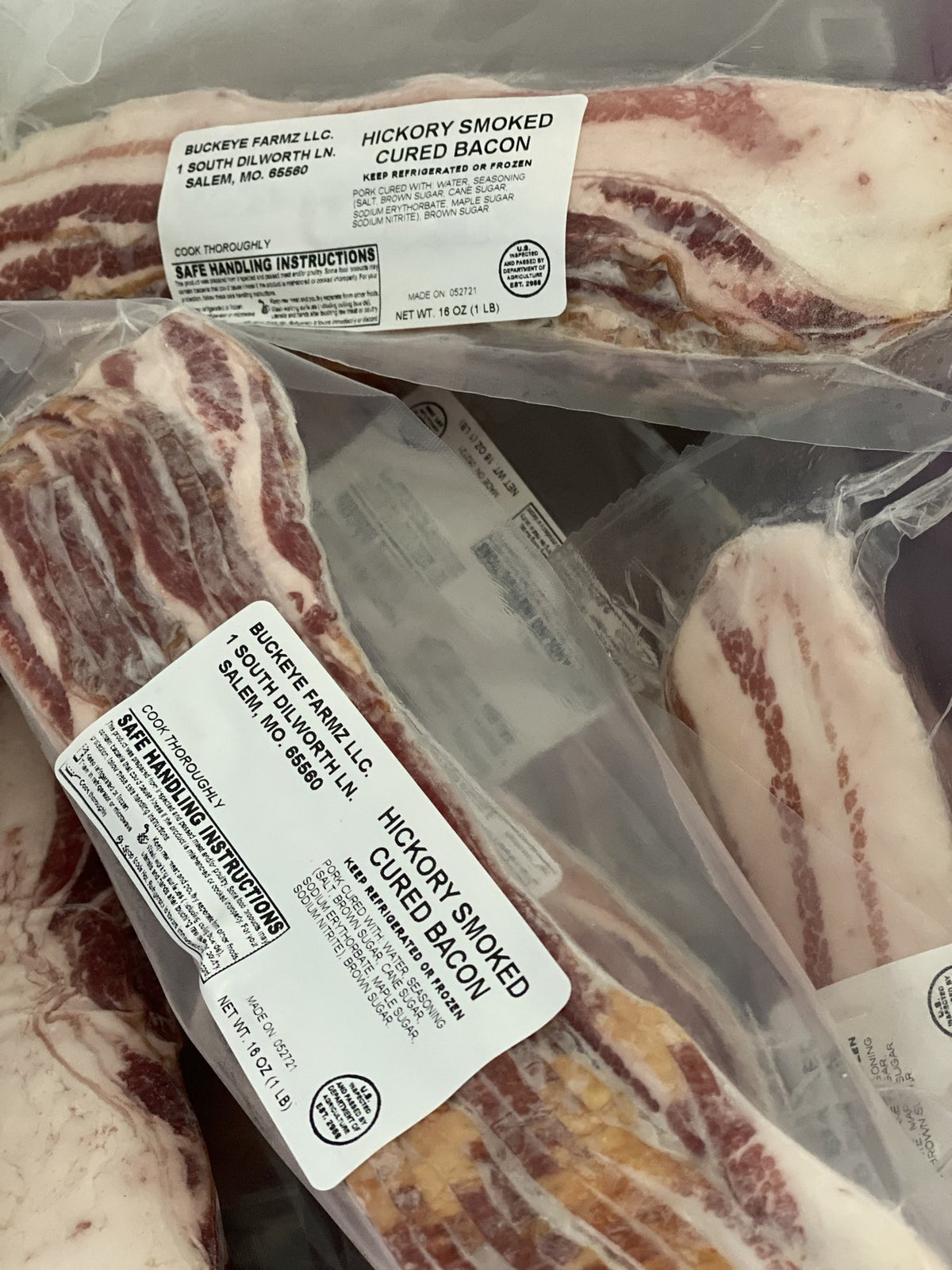 Labeled Buckeye FarmZ LLC packages of hickory smoked cured bacon