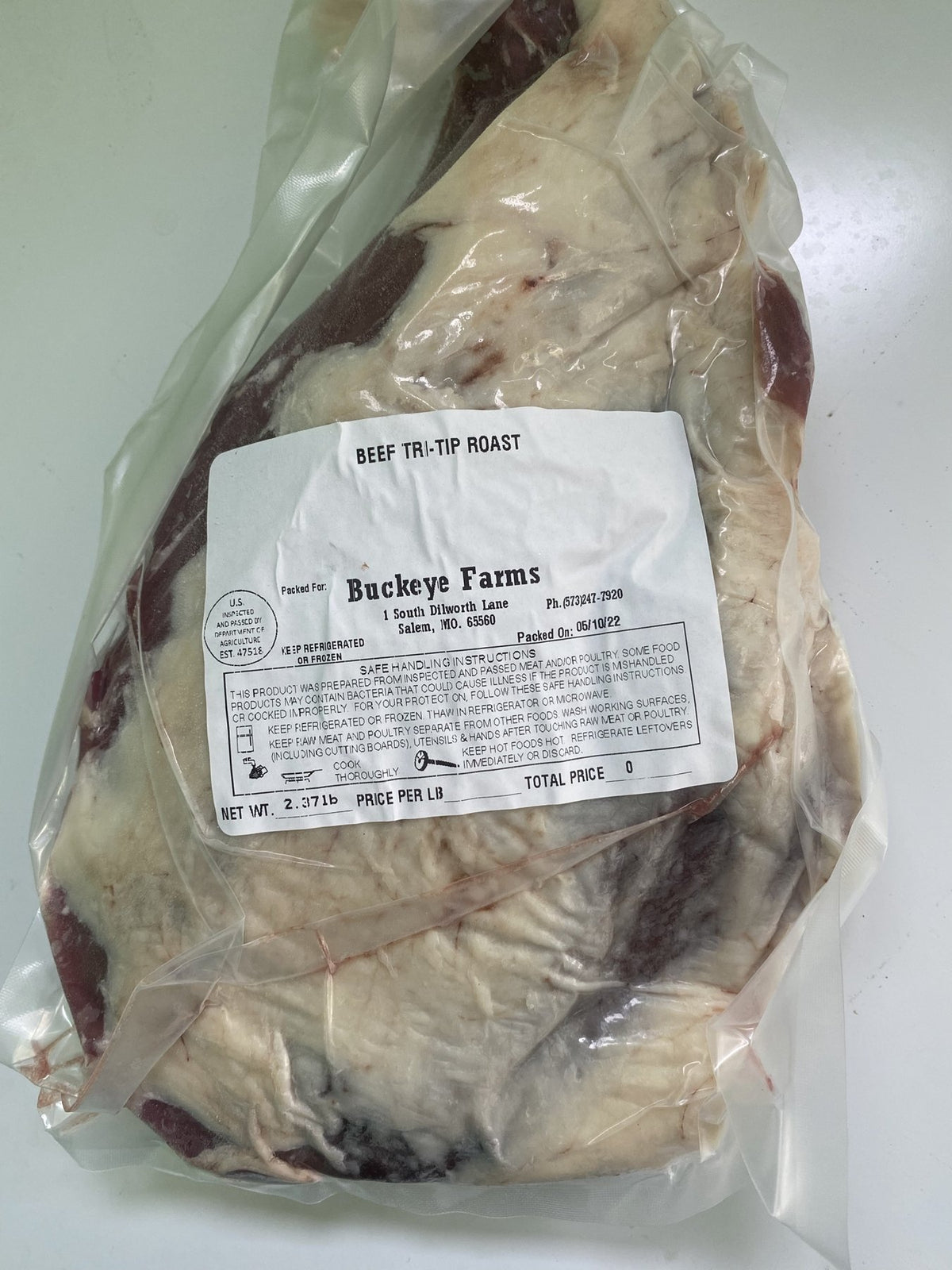 A labeled Buckeye FarmZ package of beef tri-tip roast