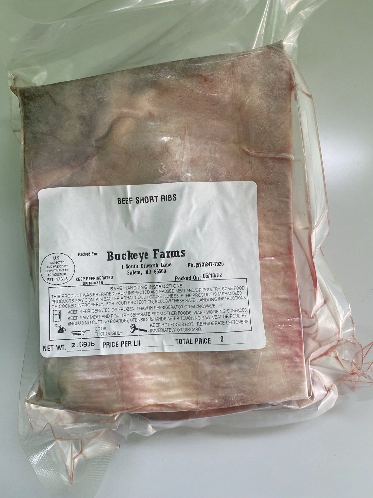 A labeled Buckeye Farms package of beef short ribs