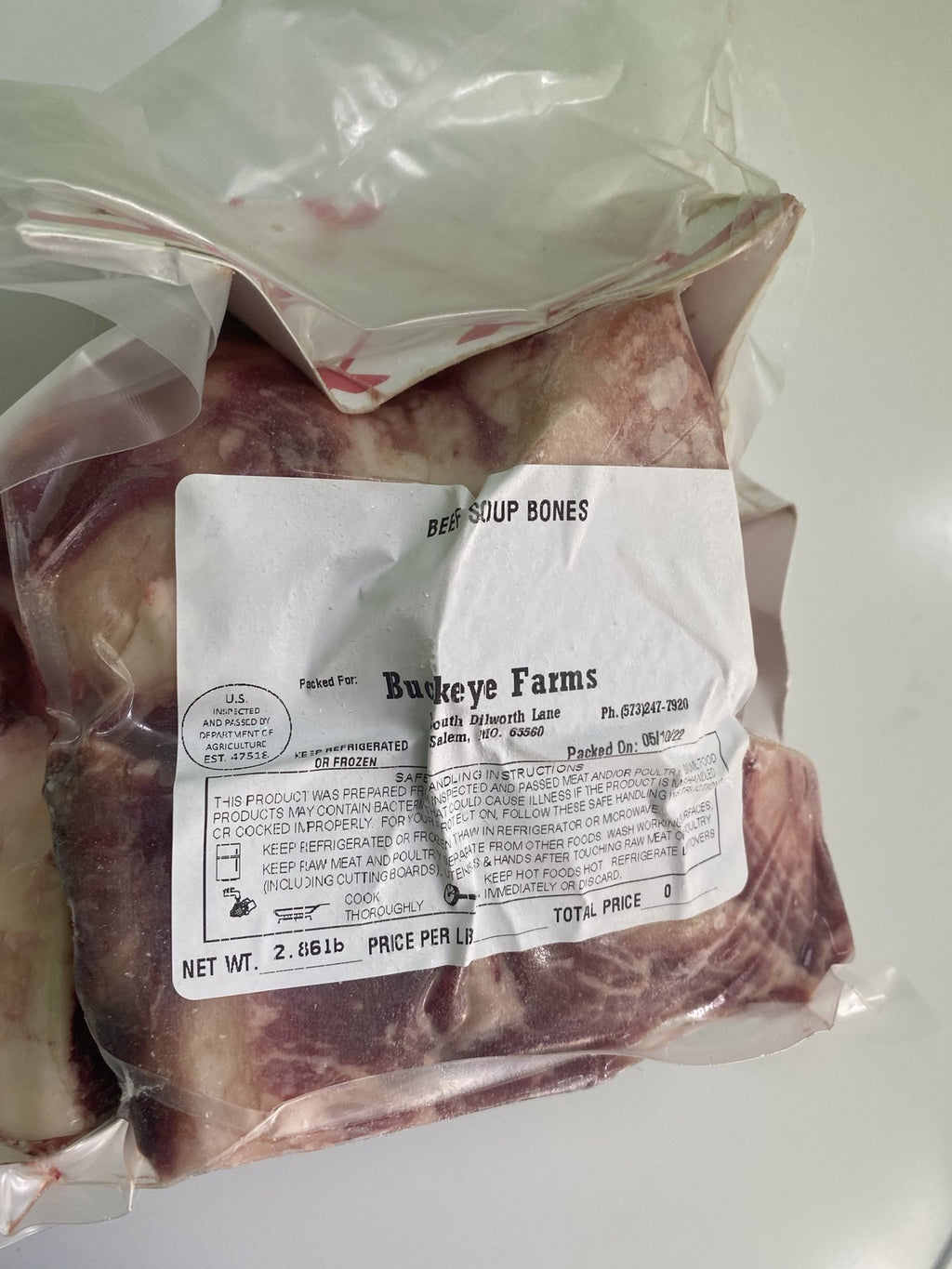 A labeled Buckeye Farms package of beef soup bones