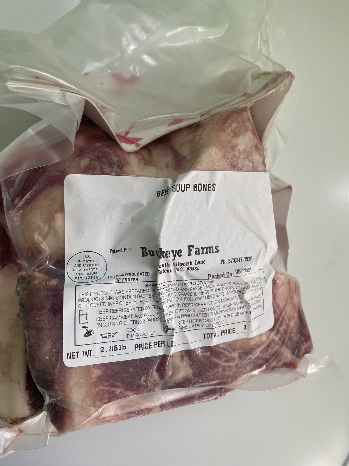 A labeled Buckeye Farms package of beef soup bones