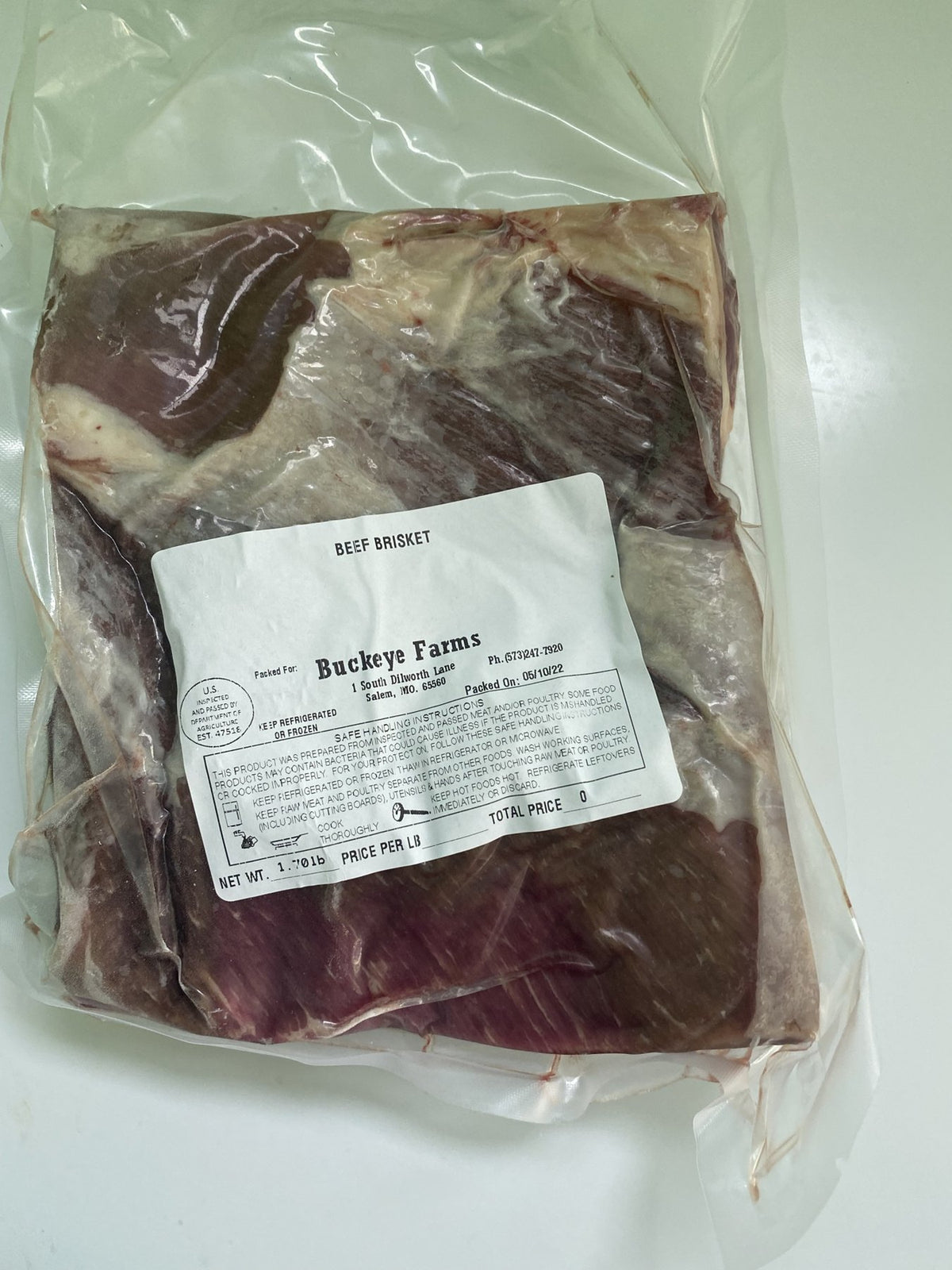 A labeled Buckeye Farms package of beef brisket