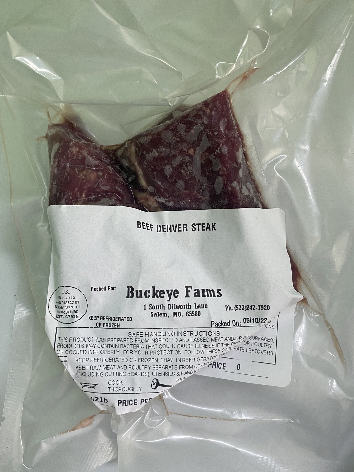 A labeled Buckeye FarmZ LLC package of beef Denver steak, processed in Missouri